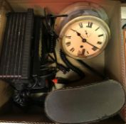 A box containing a vintage British Telecom phone with mains unit / fast charger,