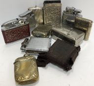 A collection of lighters to include Calibri and a Ronson Viking together with various Vesta cases