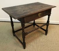 An 18th Century and later oak side table,