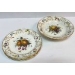 A Royal Worcester part dessert set of four plates and tazza, each with fruit decoration,