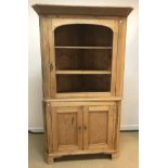 A 19th Century pine free-standing corner cabinet,