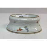 An early 20th Century Meissen trencher salt with floral spray decoration bearing blue crossed