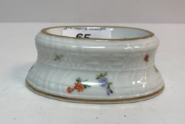 An early 20th Century Meissen trencher salt with floral spray decoration bearing blue crossed