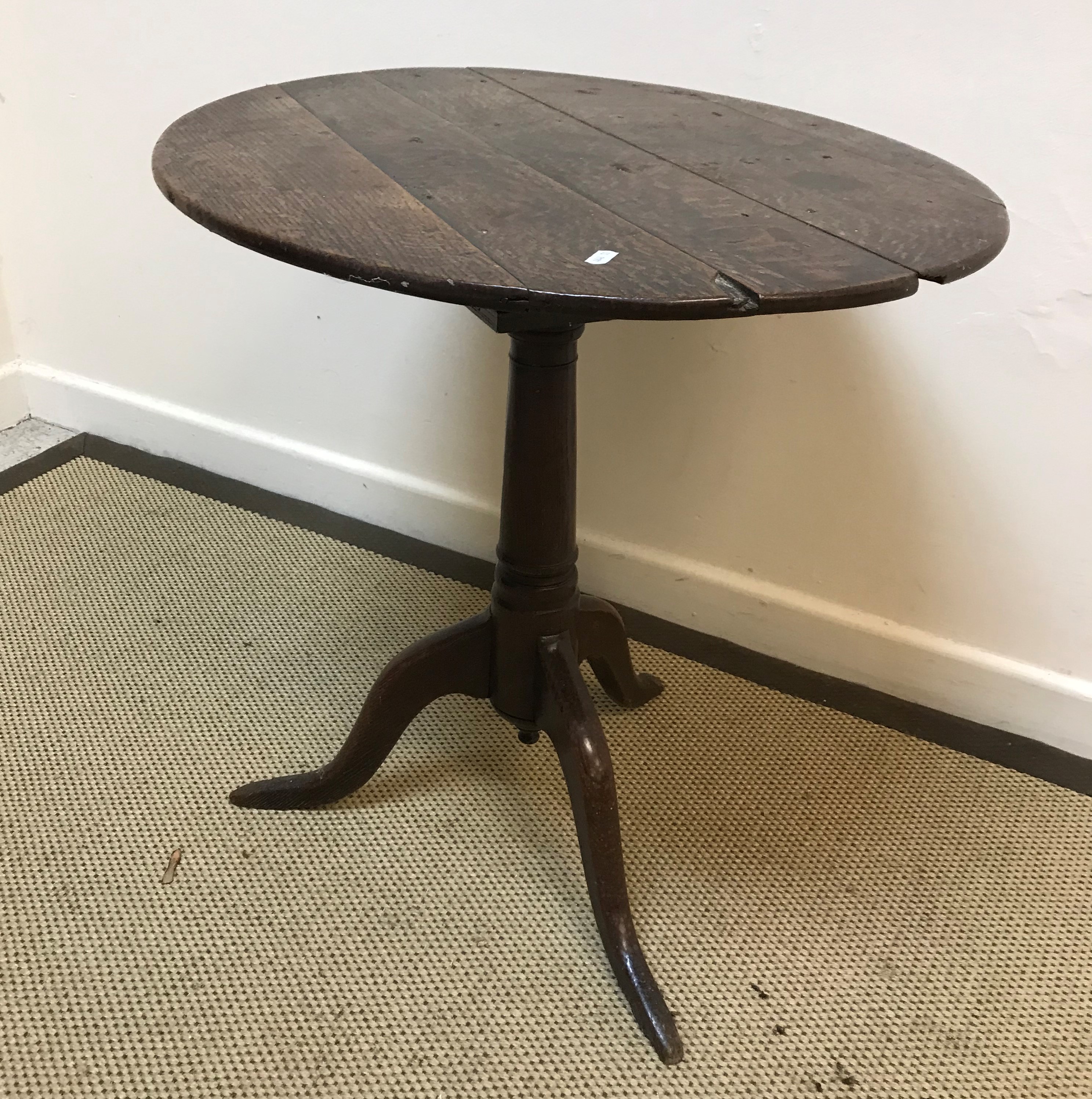 A circa 1800 oak tea table, the oval top on a birdcage to turned tapering pedestal and tripod base, - Image 4 of 5