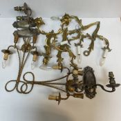 A box of various wall lights including two pairs of Rococo style scrolling acanthus twin branch