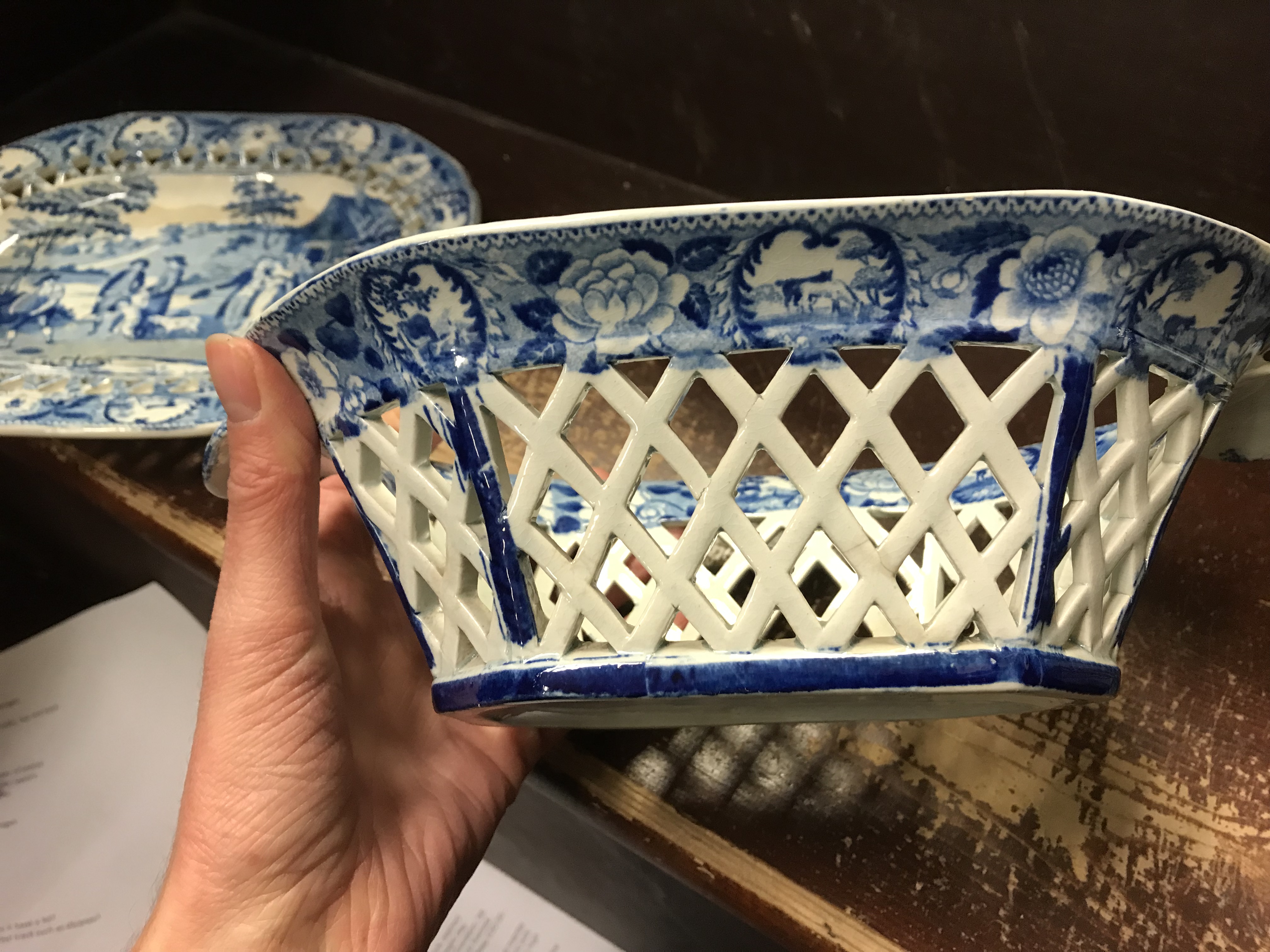 An early 19th Century blue and white transfer decorated pottery chestnut basket and stand, - Image 20 of 35