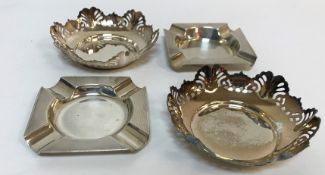 A pair of mid 20th Century silver coasters/bon bon dishes (Sheffield 1965 by Emile Viner) together