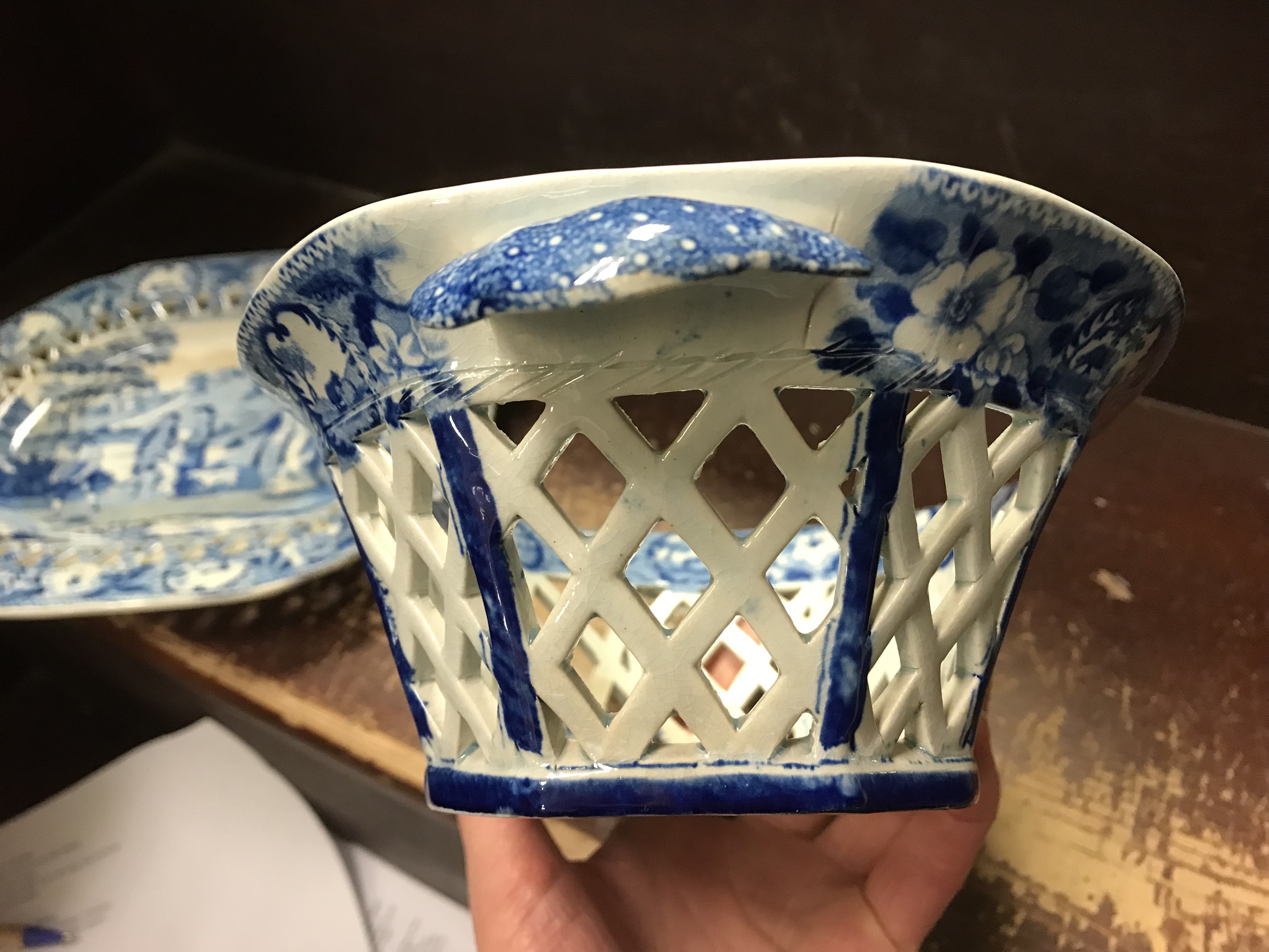 An early 19th Century blue and white transfer decorated pottery chestnut basket and stand, - Image 21 of 35