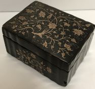 A Georgian tortoiseshell and piquet work floral decorated box of rectangular form with ribbed sides,