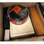 A box containing a small collection of assorted costume jewellery,