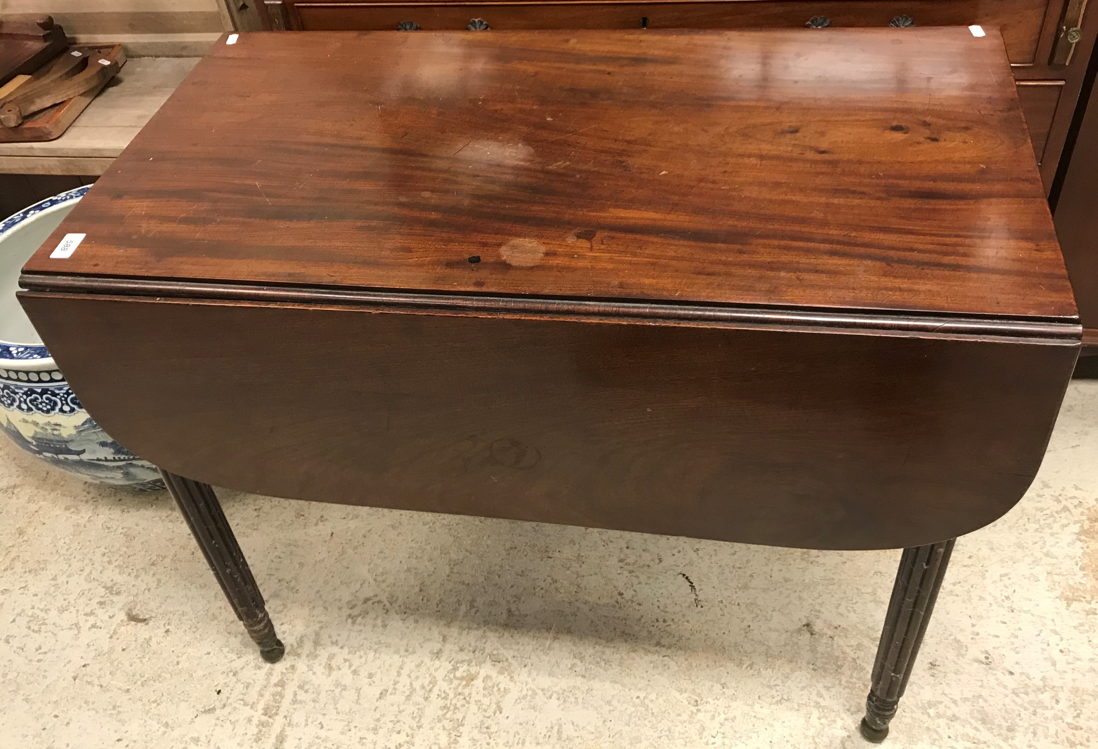 A 19th Century mahogany drop-leaf Pembroke table,