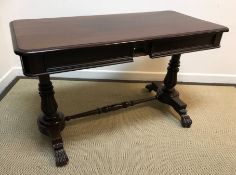 A Victorian mahogany centre table, the plain top with moulded edge over two frieze drawers,