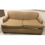 A modern fawn upholstered two seat sofa bed,