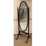 An early 20th Century mahogany cheval mirror in the Georgian style,