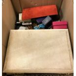 Two boxes of assorted costume jewellery to include necklaces, brooches,