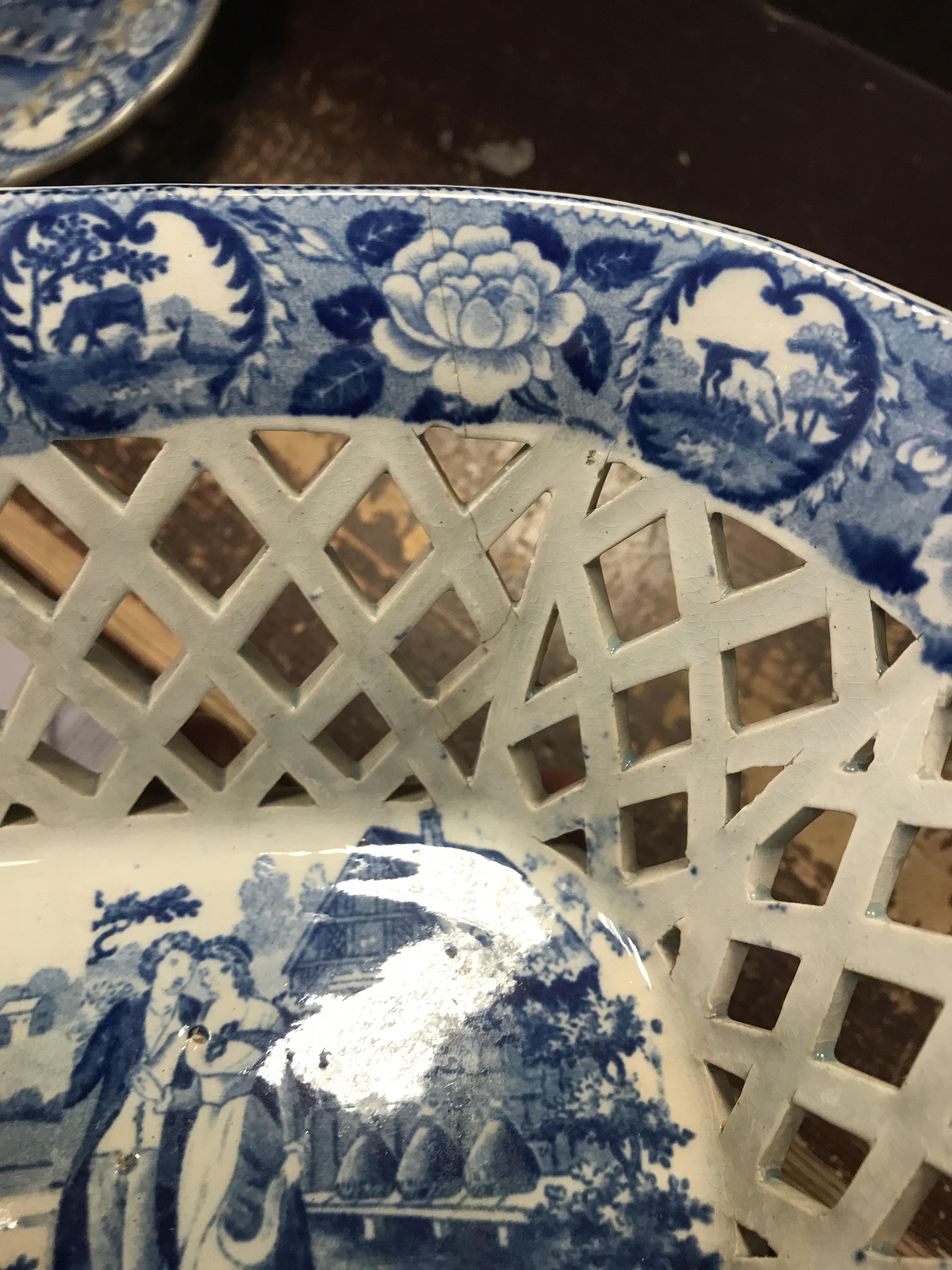 An early 19th Century blue and white transfer decorated pottery chestnut basket and stand, - Image 11 of 35
