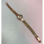 A 9 carat gold cased Omega ladies wristwatch with box and guarantee,