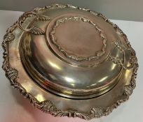 A Birks sterling silver vegetable tureen and cover with applied scrolling decoration, 27.