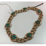 A 15 carat gold and turquoise set link bracelet 14.