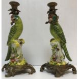 A modern pair of pottery and brass "Parrot" candlesticks bearing printed mark to base of crowned