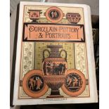 A Victorian photograph album, the front plate inscribed "Porcelain, Pottery and Portraits",