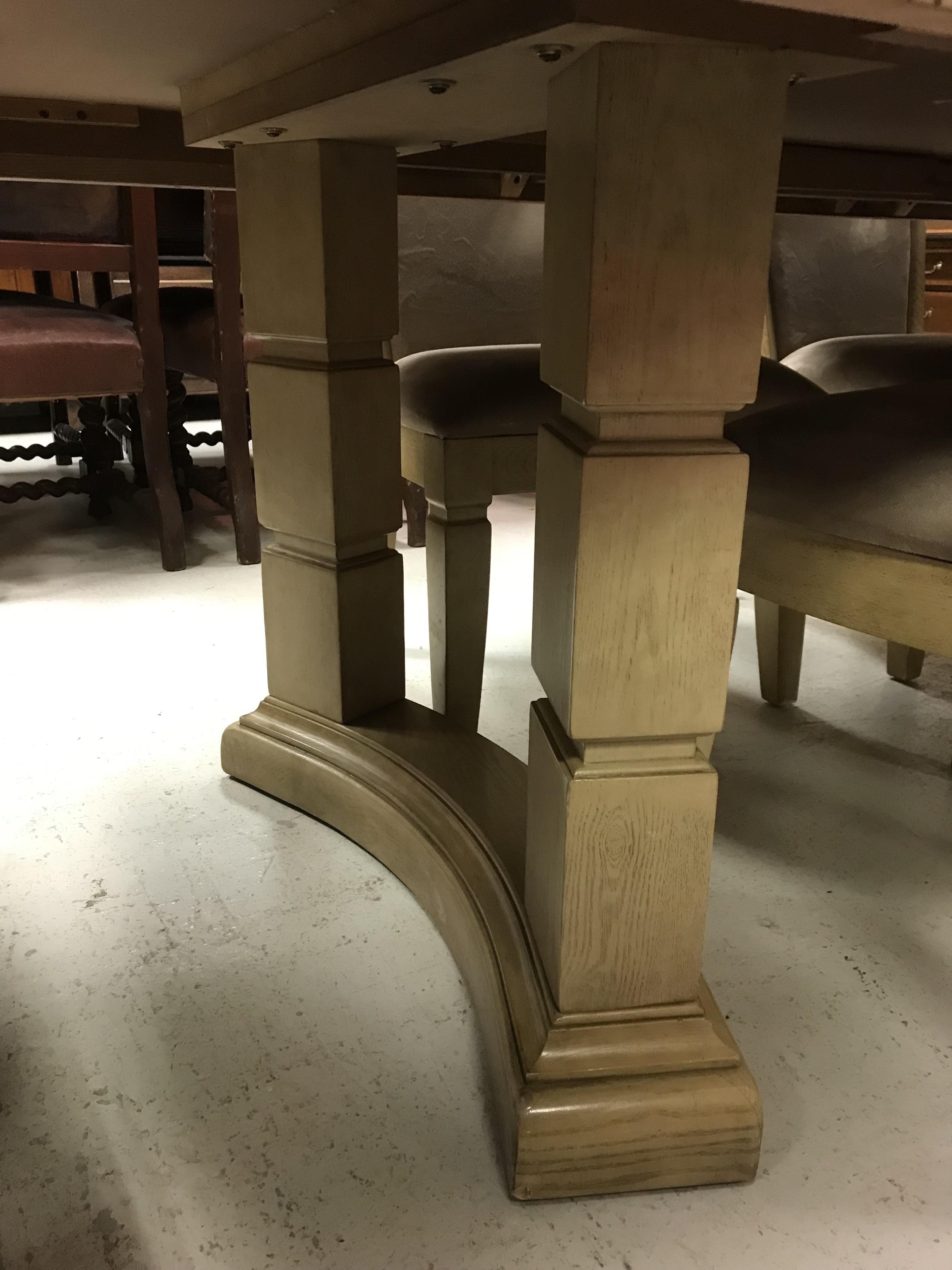 A modern stained oak and ash extending dining table on square ringed supports united by a centre - Image 35 of 50