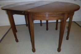 A 19th Century mahogany D end dining table of plain form,