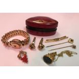 A collection of gold and yellow metal jewellery to include two 9 carat gold tie pins,