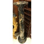 A yellow veined black marble urn stand,