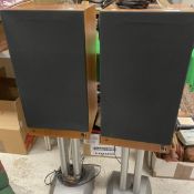 A pair of Alphason KEF Model 103.2 teak cased speakers Type SP1121 on twin pillar supports, 26.