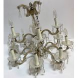 A 20th Century moulded and cut glass twelve light electrolier in the Venetian taste,
