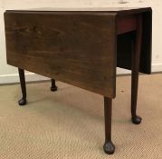 A George III mahogany drop-leaf dining table,