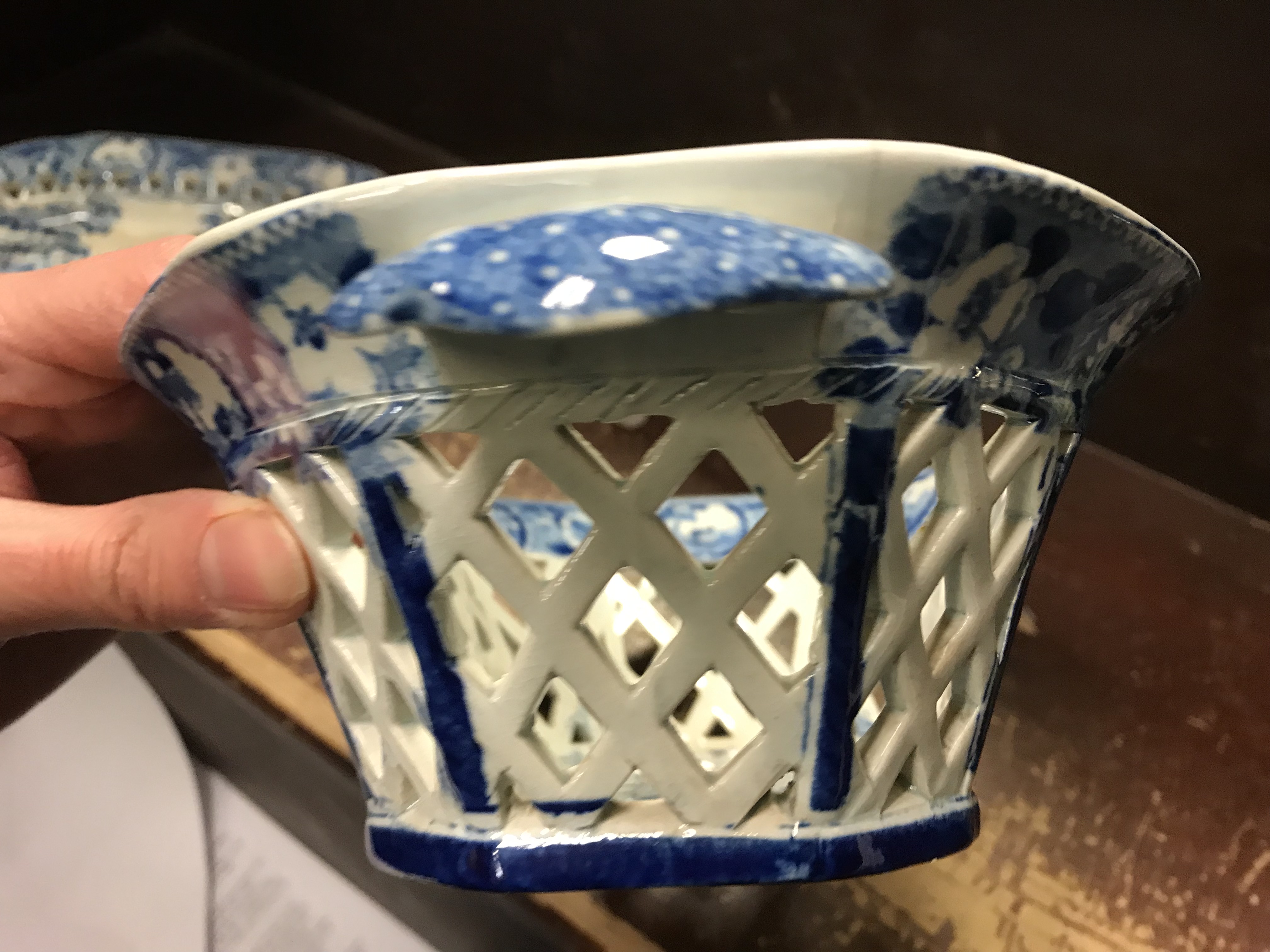 An early 19th Century blue and white transfer decorated pottery chestnut basket and stand, - Image 18 of 35
