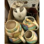 Two boxes of various Studio pottery to include Carltonware floral decorated jugs and vases,