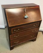 An Edwardian mahogany and satinwood banded bureau,