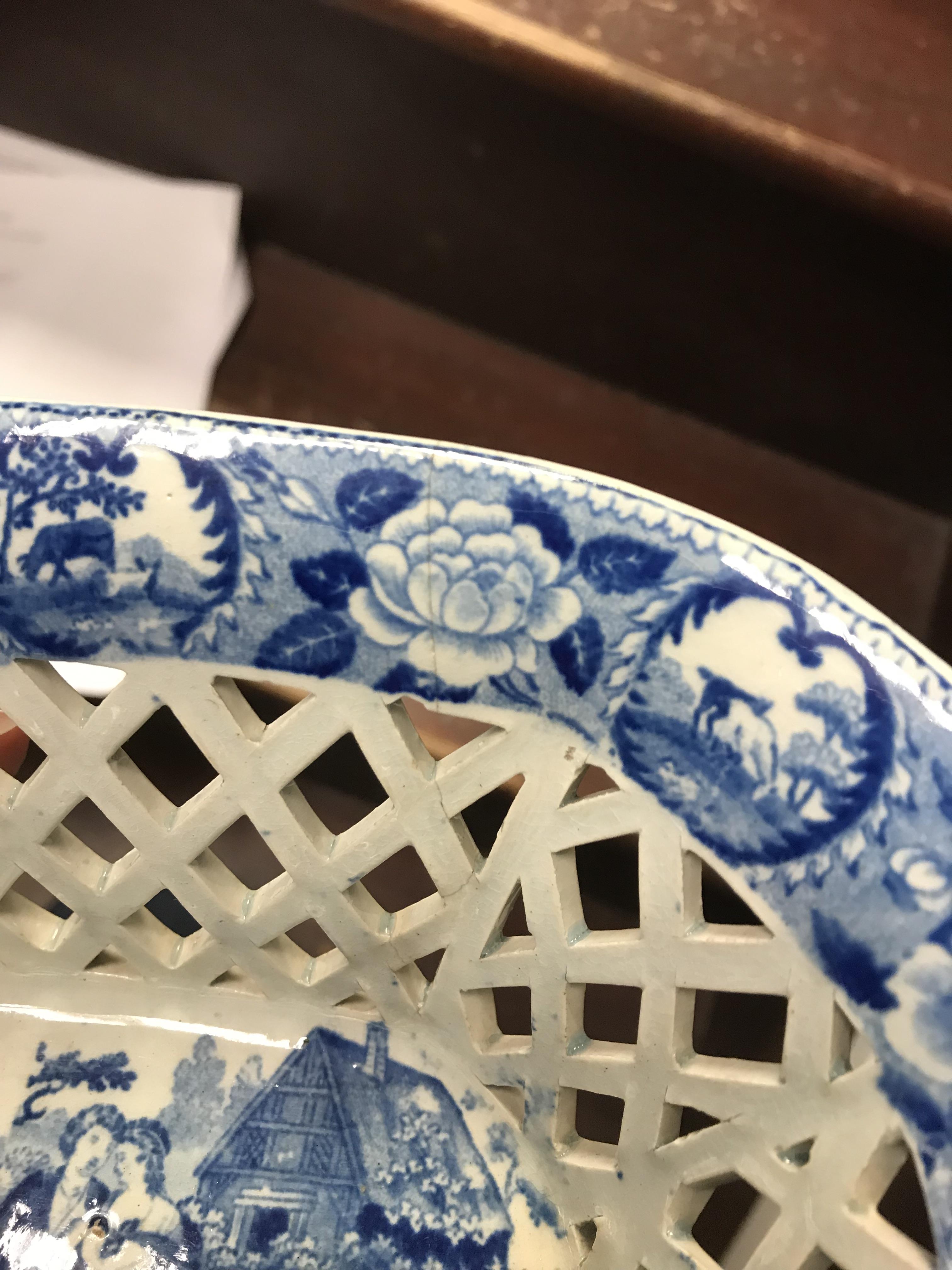 An early 19th Century blue and white transfer decorated pottery chestnut basket and stand, - Image 9 of 35