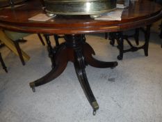 An oval brass coal box in the Regency taste, mahogany bar back carver chair,