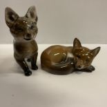 A Rosenthal figure of a seated fox cub by R Sinko 8.7 cm long x 4.