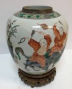 A Chinese Kangxi palette jar depicting five various figures riding upon the backs of kylin with