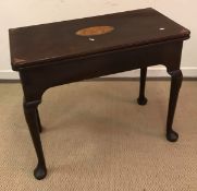 An early George III mahogany card table,