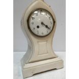 A 19th Century French white marble cased mantel clock of lancet form,