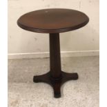 A set of six modern mahogany and stained beech pedestal occasional tables,