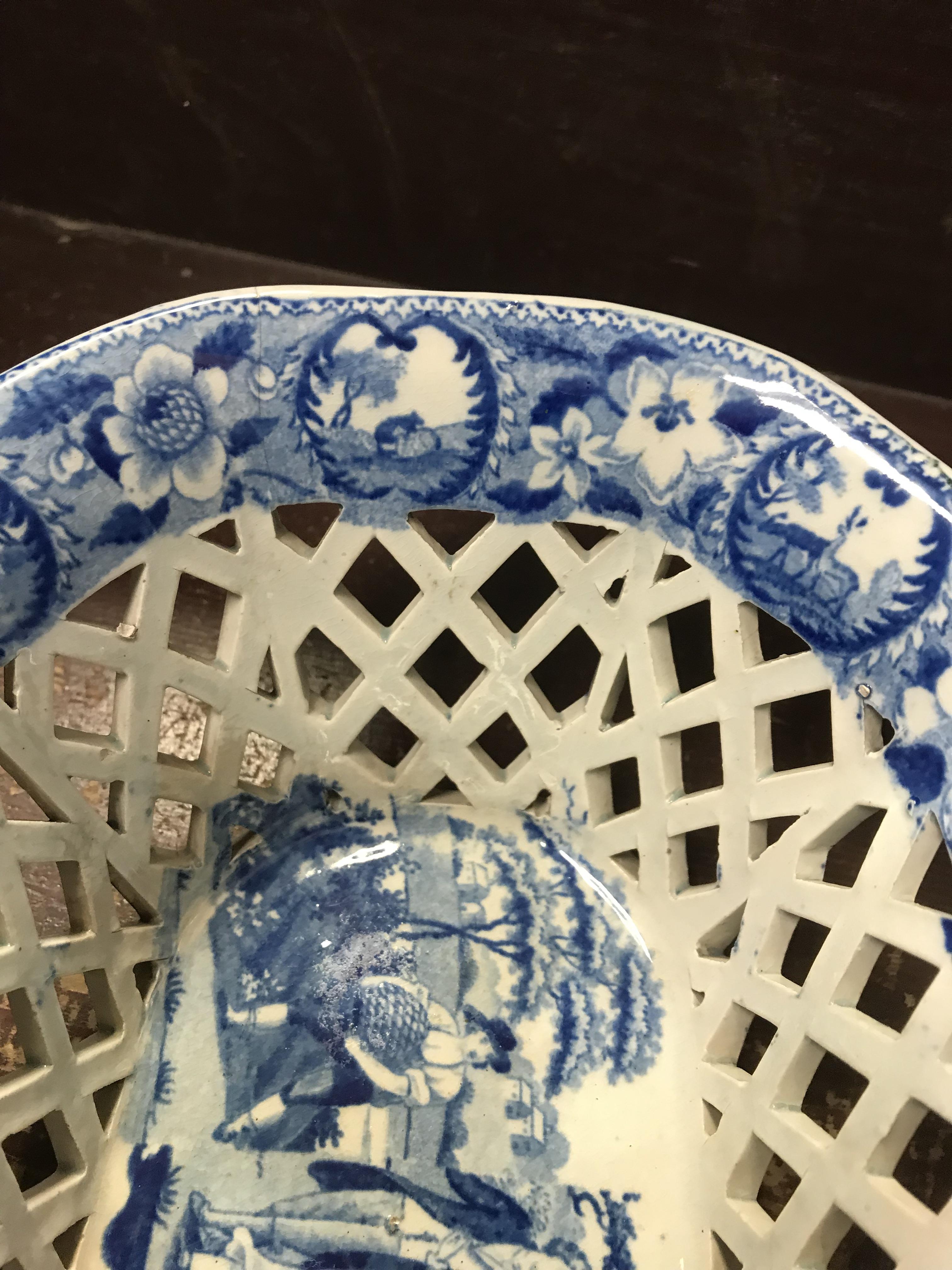 An early 19th Century blue and white transfer decorated pottery chestnut basket and stand, - Image 5 of 35
