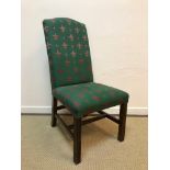 A set of eight modern fleur de lys red on green upholstered high back dining chairs on reeded beech