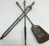 A set of three 19th Century brass handled steel fire irons,