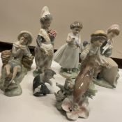 A collection of seven various Lladro figures including "Young girl with basket of flowers and bird"