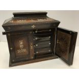 A Victorian rosewood and mother of pearl inlaid table top jewellery chest of sarcophagus form,