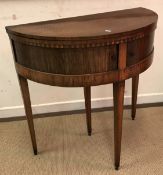 A George III mahogany and parquetry work inlaid fold-over tea table of demi-lune form,