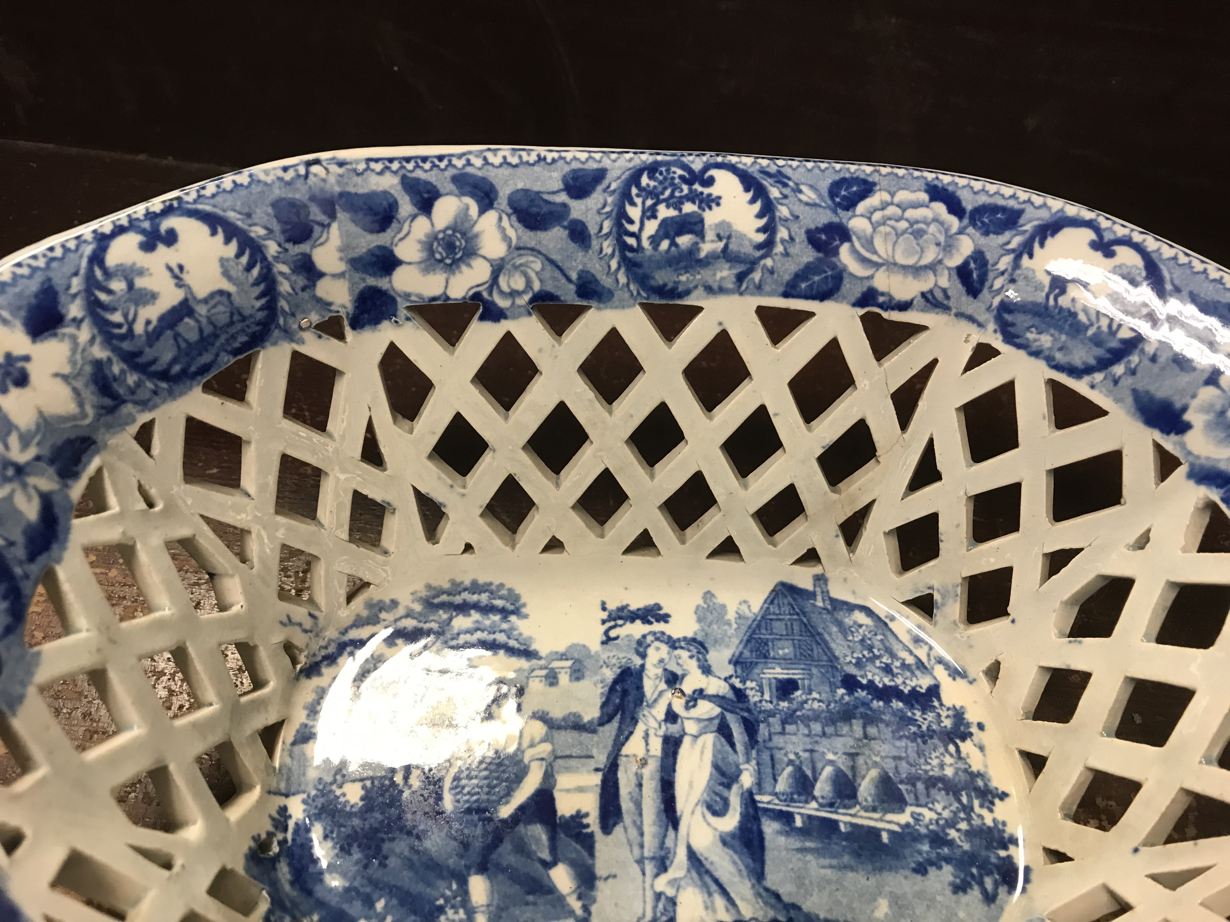 An early 19th Century blue and white transfer decorated pottery chestnut basket and stand, - Image 2 of 35