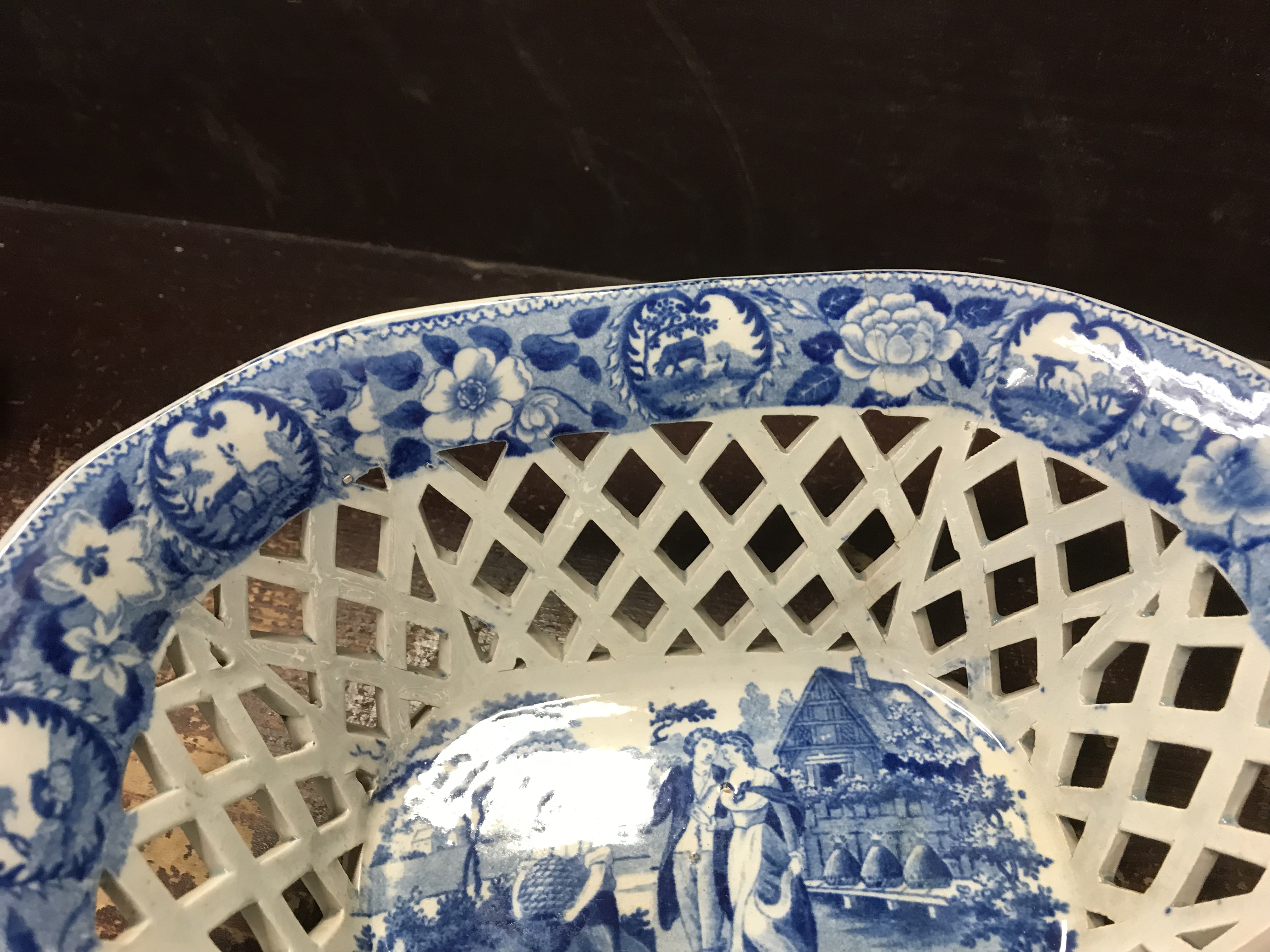 An early 19th Century blue and white transfer decorated pottery chestnut basket and stand, - Image 14 of 35